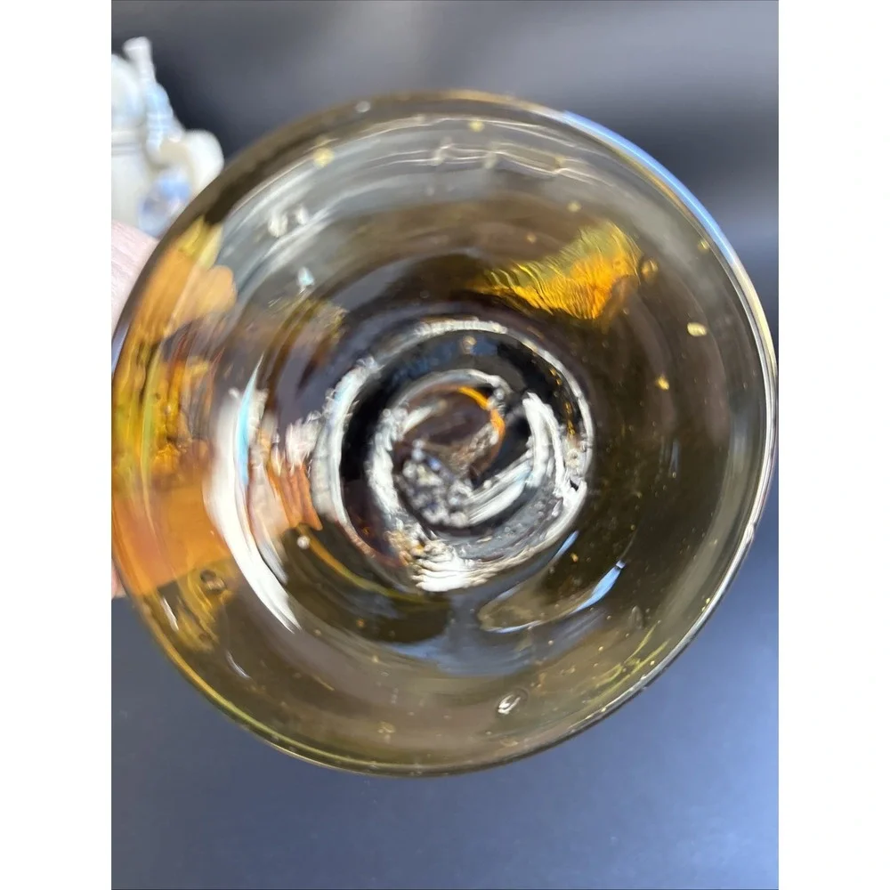 Mid-Century Modern Amber Glass Fan Vase featuring an optic ribbed pattern.